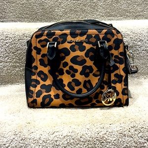 Michael Kors cheetah print bag.
